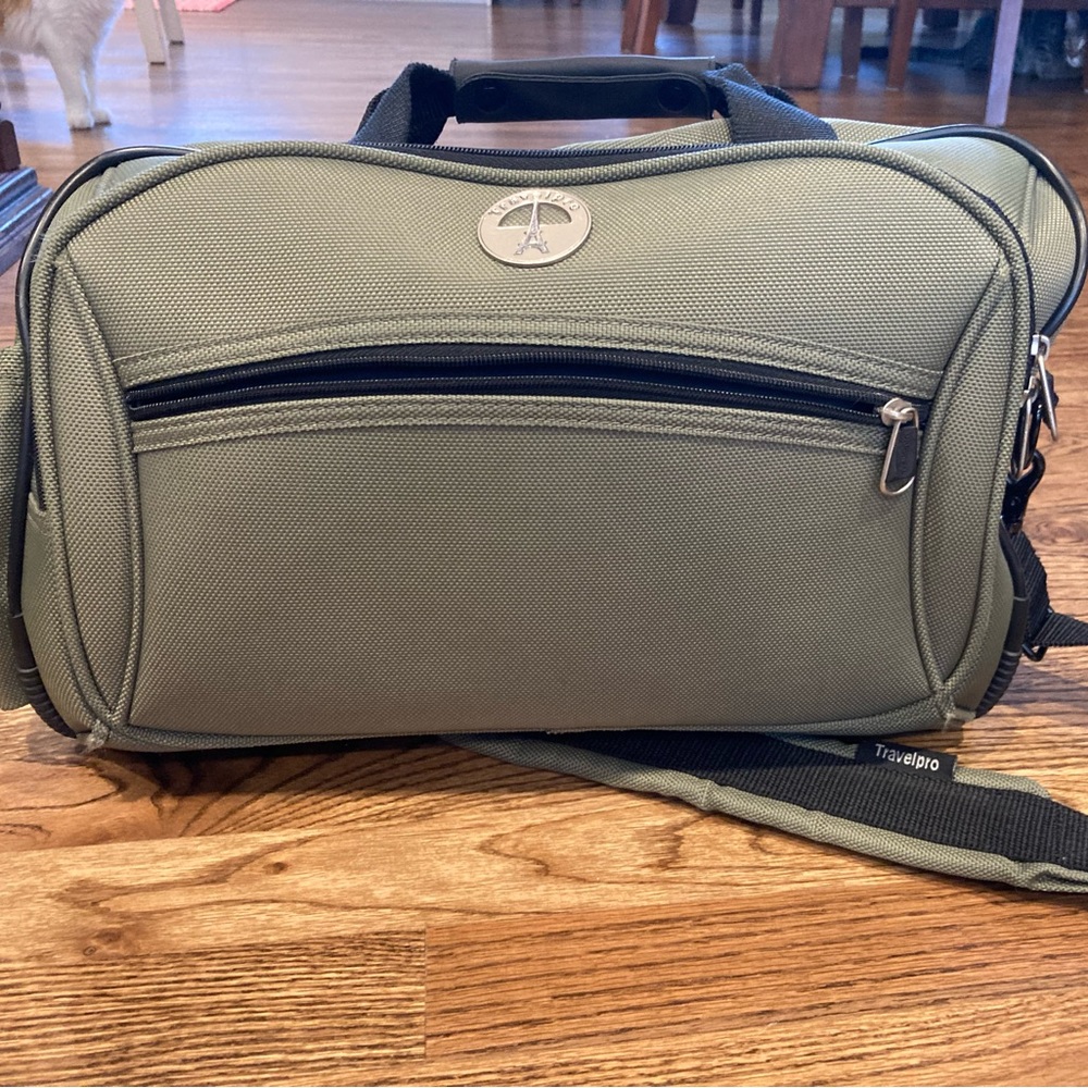Travelpro soft-sided carryon bag.  Sage green.